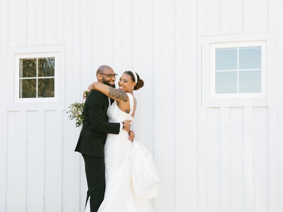A couple laughing together during a quiet, joyful moment